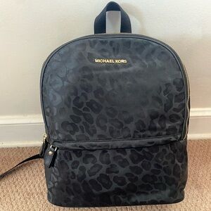 Michael Kors Cheetah Print Black Backpack - used